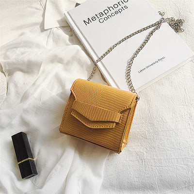 Petit sac à bandoulière en cuir texturé rond ou carré