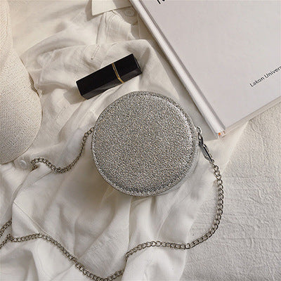Petit sac à bandoulière en cuir texturé rond ou carré