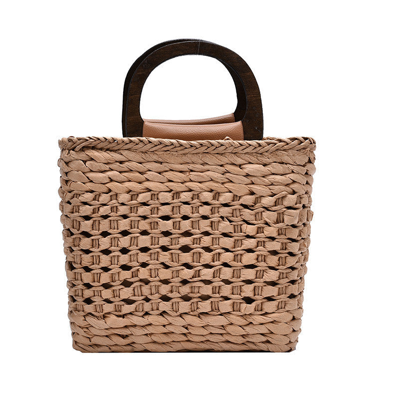 Sac à main en fibre naturelle tressée avec double anses en bois et bandoulière en cuir