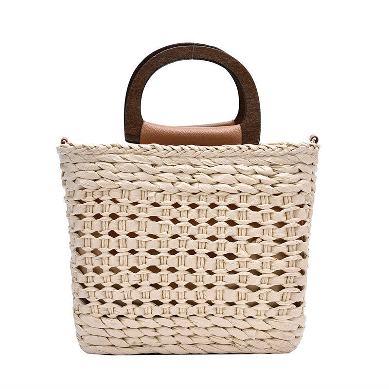 Sac à main en fibre naturelle tressée avec double anses en bois et bandoulière en cuir