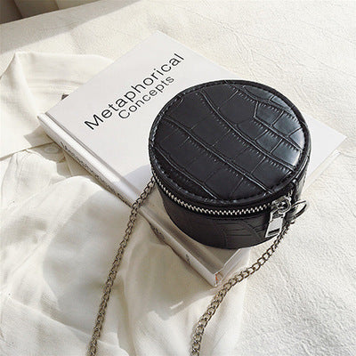 Petit sac à bandoulière en cuir texturé rond ou carré
