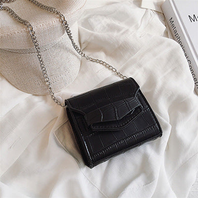 Petit sac à bandoulière en cuir texturé rond ou carré
