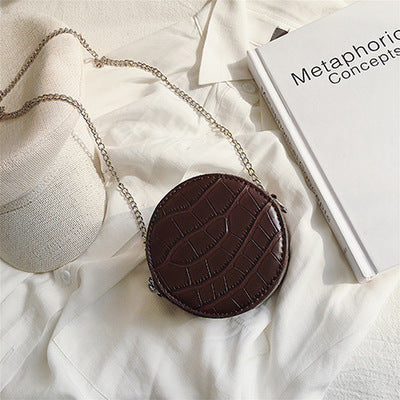 Petit sac à bandoulière en cuir texturé rond ou carré