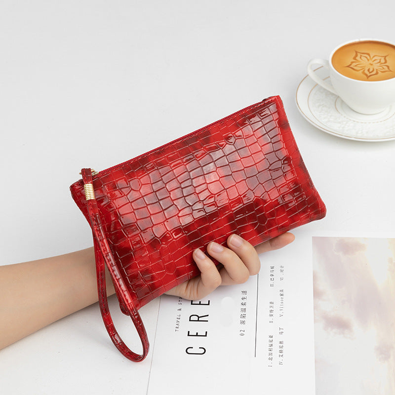 Pochette en cuir imitation peau de crocodile