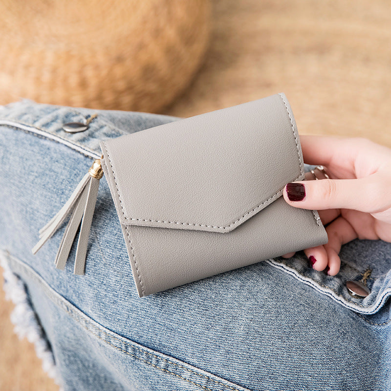 Portefeuille en cuir grainé triple volet