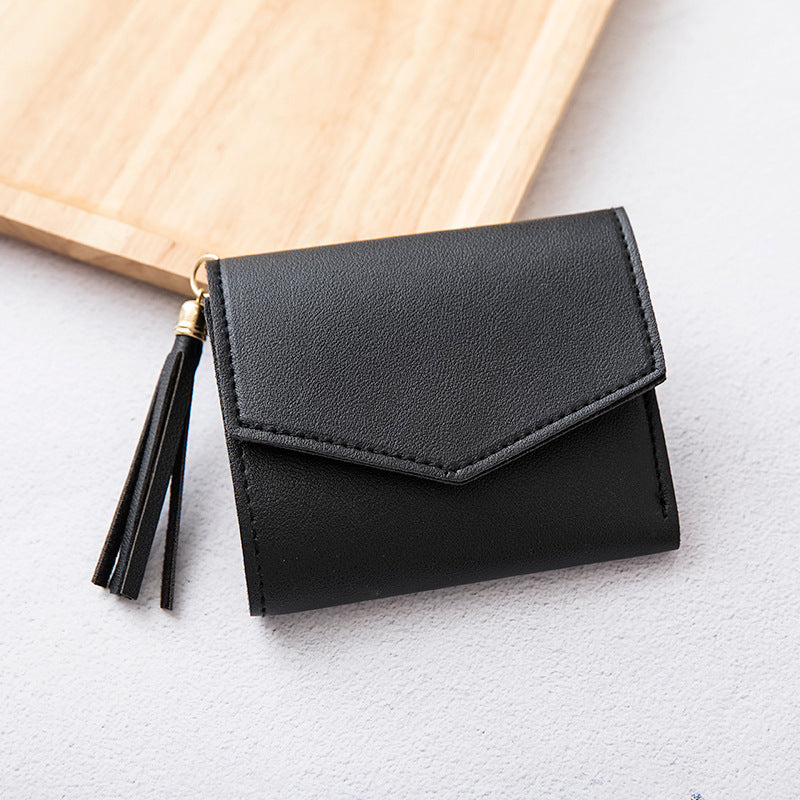 Portefeuille en cuir grainé triple volet