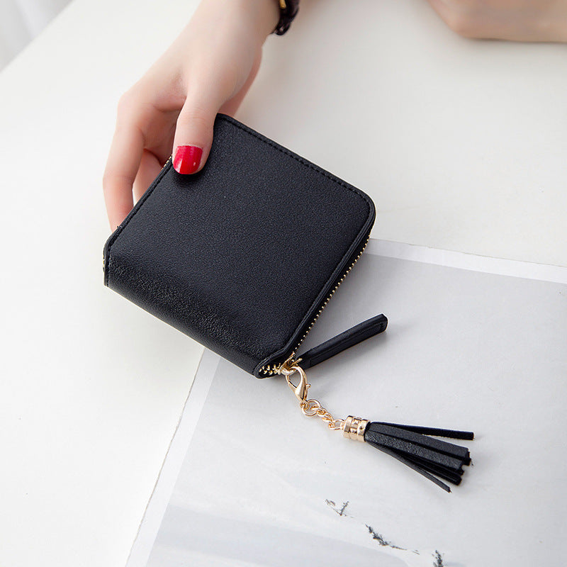 Petit portefeuille carré en cuir grainé