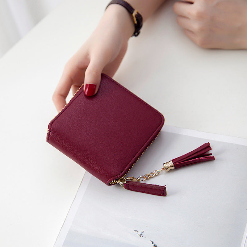 Petit portefeuille carré en cuir grainé