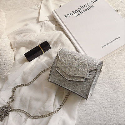 Petit sac à bandoulière en cuir texturé rond ou carré