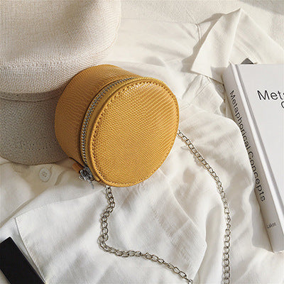 Petit sac à bandoulière en cuir texturé rond ou carré