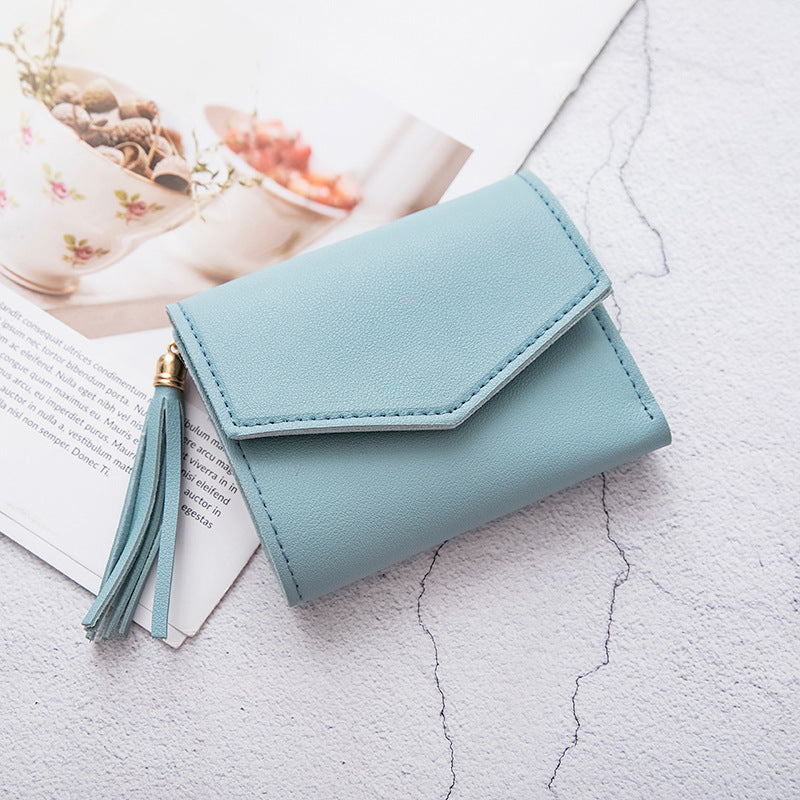 Portefeuille en cuir grainé triple volet