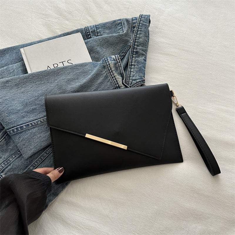 Grande pochette à rabat en cuir lisse