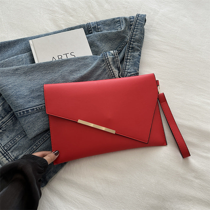 Grande pochette à rabat en cuir lisse