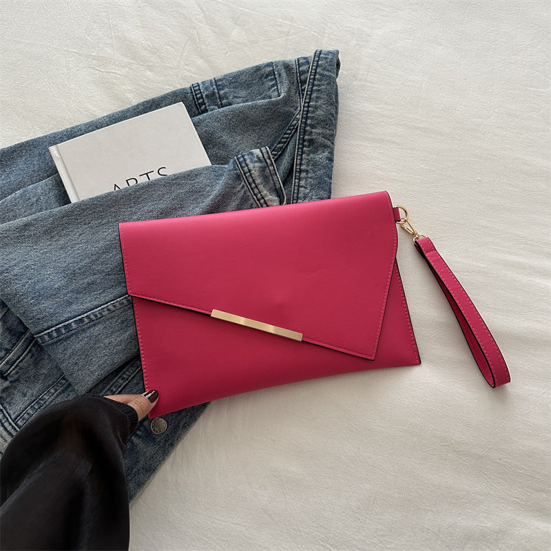 Grande pochette à rabat en cuir lisse