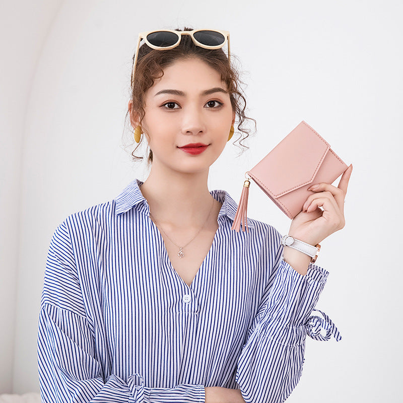 Portefeuille en cuir grainé triple volet