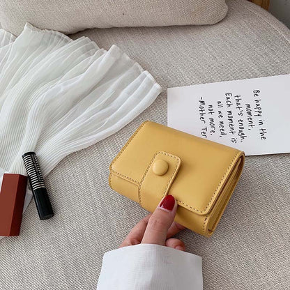 Pochette avec miroir en cuir texturé