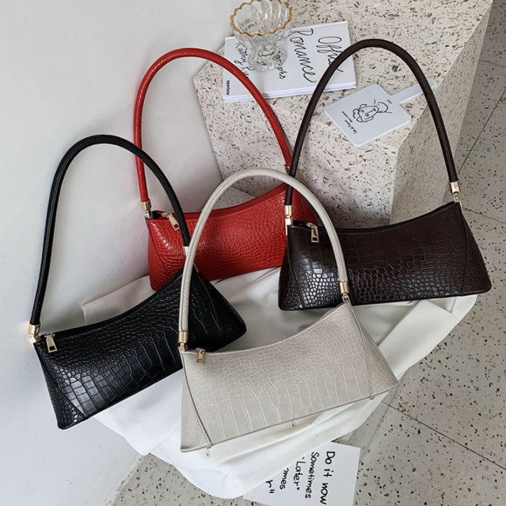 Sac baguette en cuir texturé