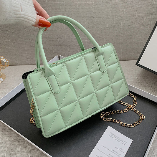 Sac à main en cuir lisse texturé avec double anses et bandoulière amovible