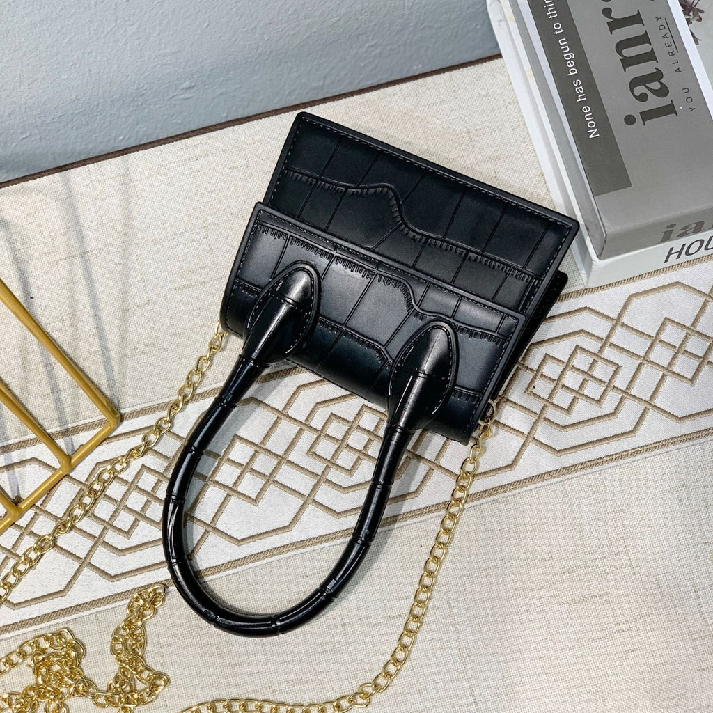 Petit sac à main en cuir texturé