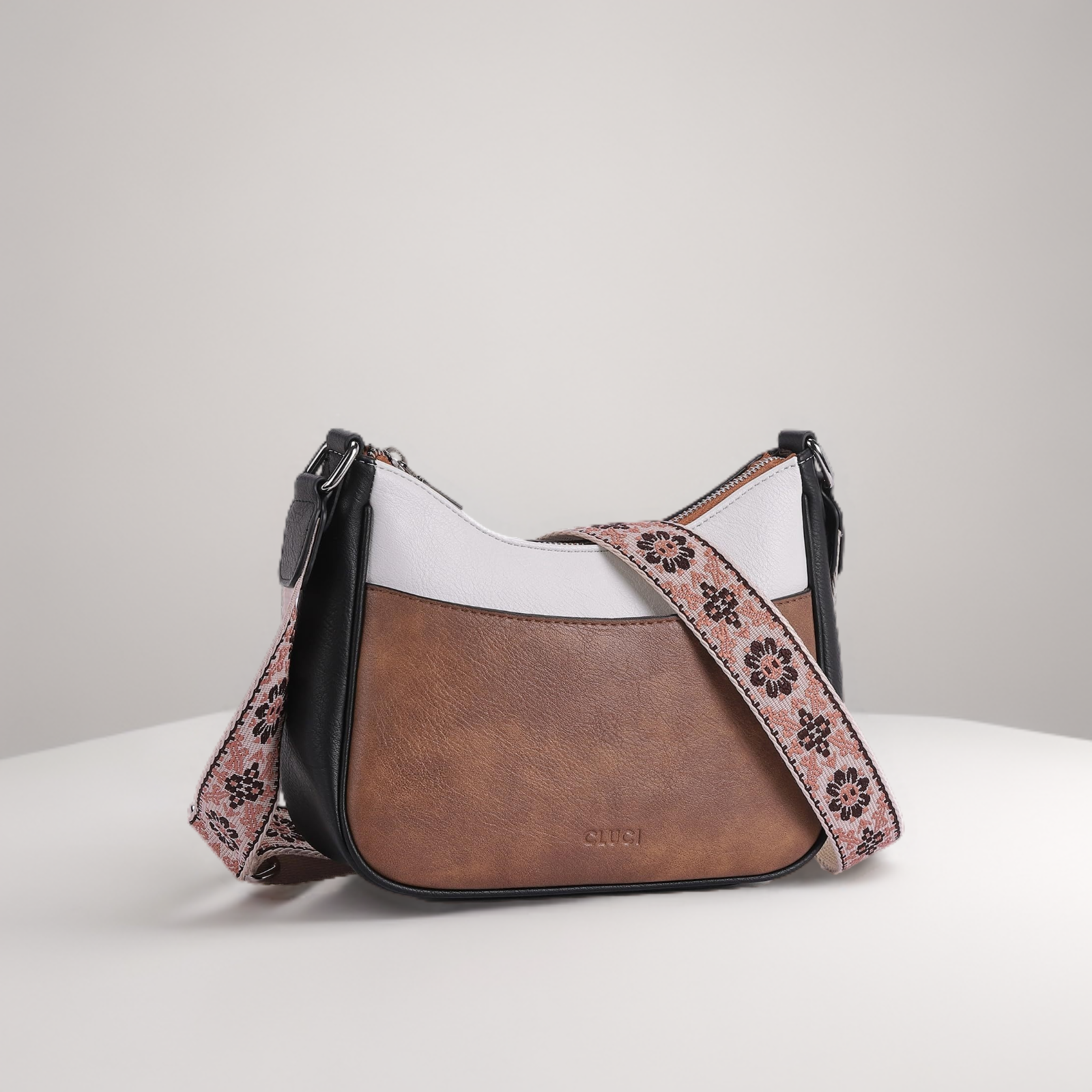 Sac à bandoulière à motifs en cuir