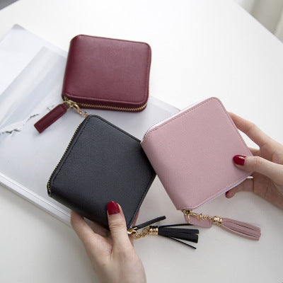 Petit portefeuille carré en cuir grainé