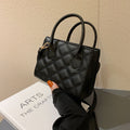 Sac à main en cuir matelassé