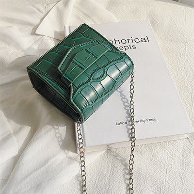 Petit sac à bandoulière en cuir  texturé rond ou carré
