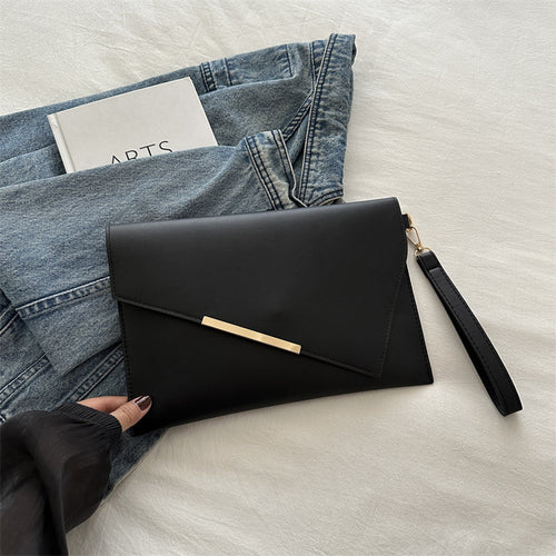 Grande pochette à rabat en cuir lisse