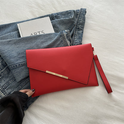 Grande pochette à rabat en cuir lisse