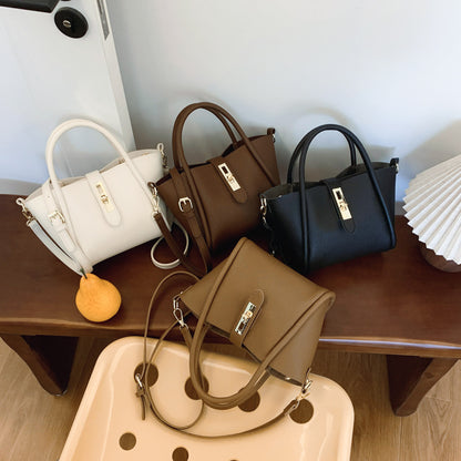 Sac à main en cuir grainé fermoir tourniquet