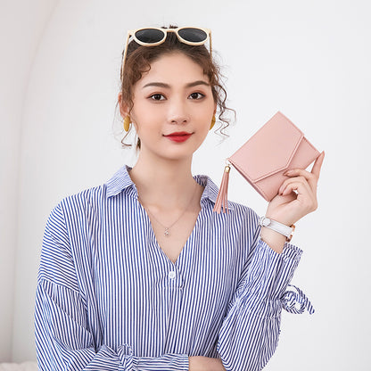 Portefeuille en cuir grainé triple volet