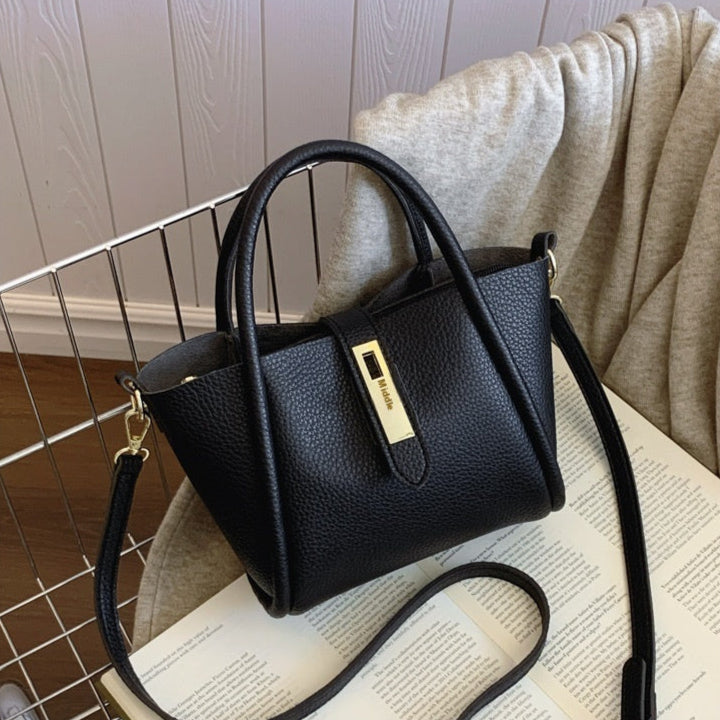 Sac à main en cuir grainé fermoir tourniquet