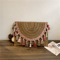 Sac d'épaule en fibre naturelle avec pompons